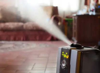 A humidifier emits mist in a home.